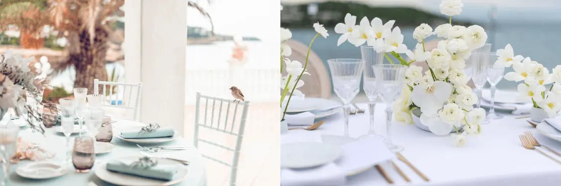 Mesa elegante al aire libre con tonos suaves y decoración en blanco. Vajilla delicada, cristalería refinada y detalles florales con orquídeas y rosas blancas, creando un ambiente sofisticado y fresco junto al mar.